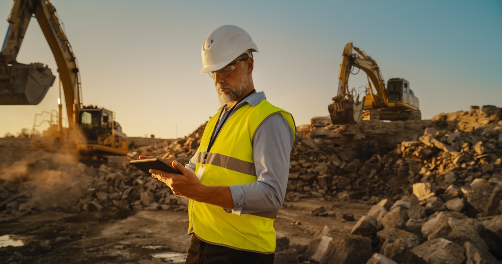 Caucasian,Male,Civil,Engineer,Wearing,Protective,Goggles,And,Using,Tablet Caucasian,Male,Civil,Engineer,Wearing,Protective,Goggles,And,Using,Tablet